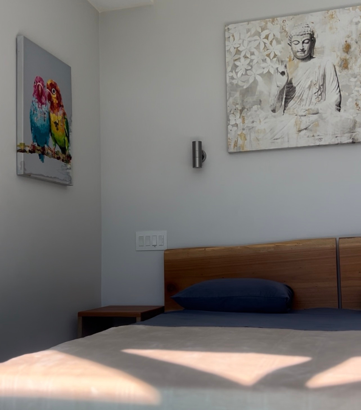 Minimal hotel room with artwork